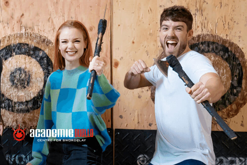 Couple enjoying axe throwing on date night