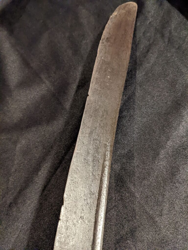 Period-use edge chips on historical sword