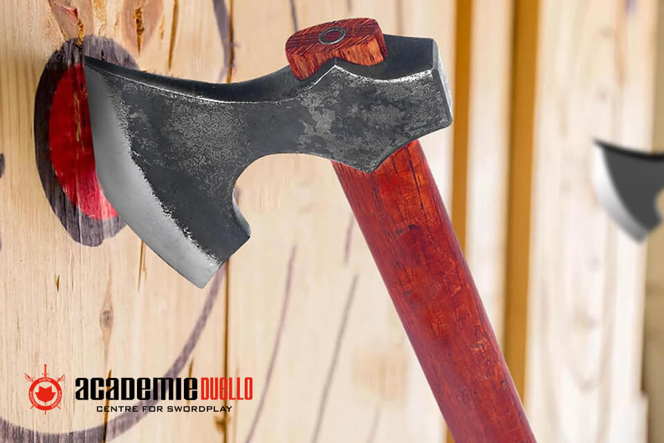 Person demonstrating proper axe throwing technique