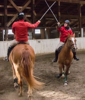 Allie & Christian cross swords in a Prix Fiore test